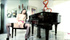 Stockings-clad piano player fingering her cunt