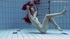 Liza Rachinska filmed underwater while swimming around naked