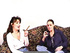 Ponytailed brunette smoking a cigarette and her friend prefers cigars
