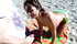 A hot brunette in a skimpy bikini invites a horny voyeur for a closer look at the beach